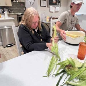 Seniors busy peeling the corns in Senior Home